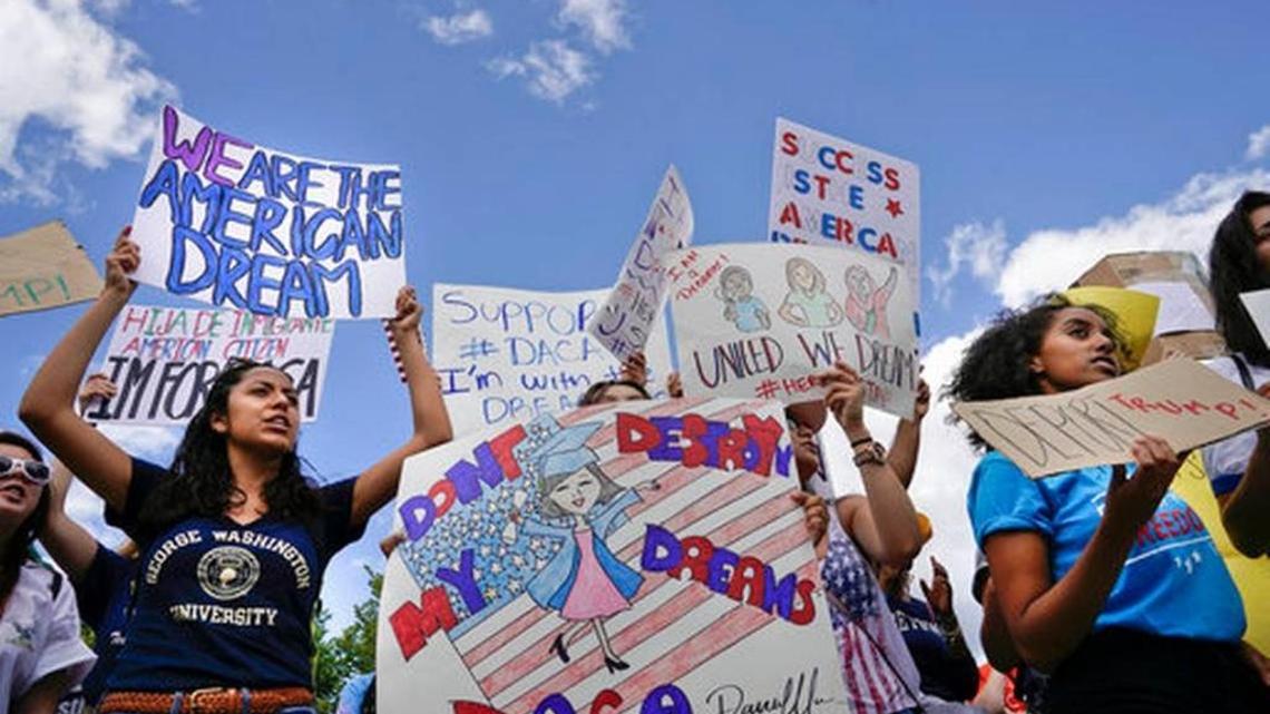 Supporters of Deferred Action for Childhood Arrival program (DACA) demonstrate on Pennsylvania Avenue in front of the White House in Washington, Saturday, Sept. 9, 2017. President Donald Trump ordered and end of protections for young immigrants who were brought into the country illegally as children, but gave Congress six months to act on it.