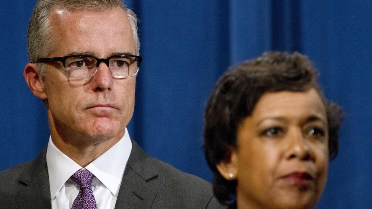 FBI Deputy Director Andrew McCabe, left, and Attorney General Loretta Lynch, listen during a news conference, Wednesday, July 20, 2016, at the Justice Department in Washington. McCabe is now the acting director of the FBI.
