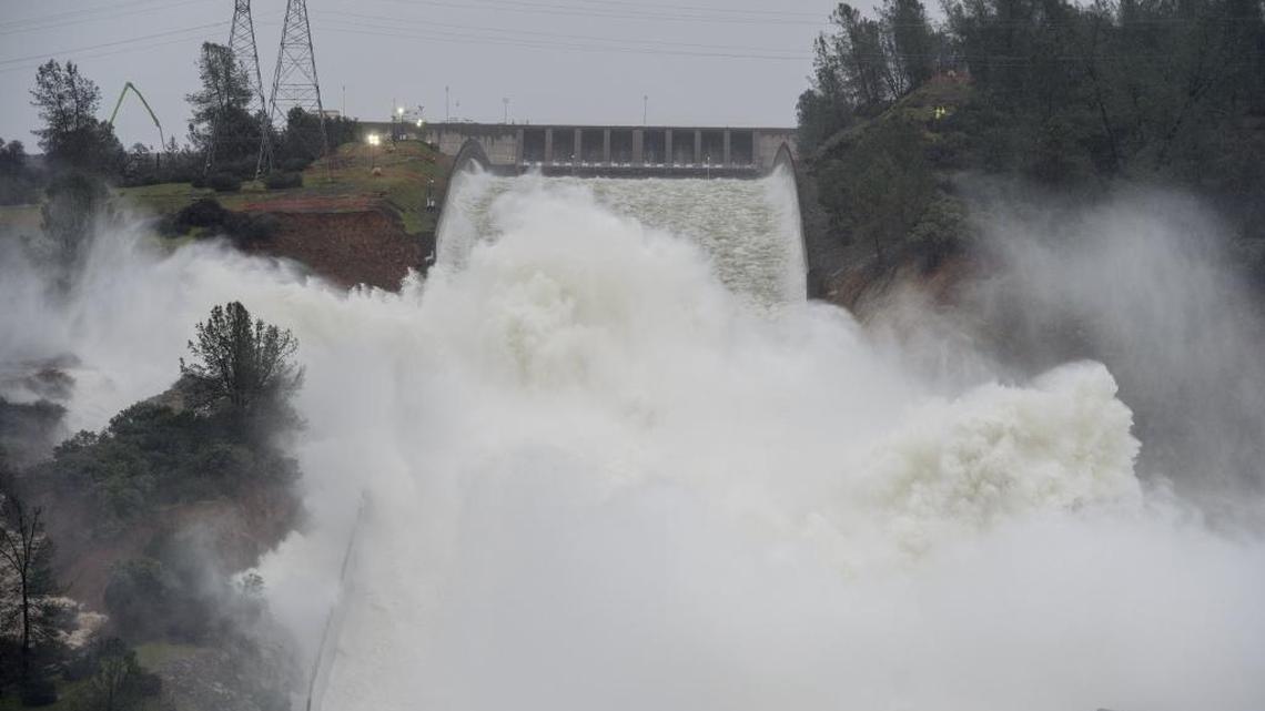 Water released from the Oroville Dam travels down the spillway on Friday afternoon, February 17, 2017. A bill from Rep. Tom McClintock, D-Calif. aims to streamline the process for building dams in the state.