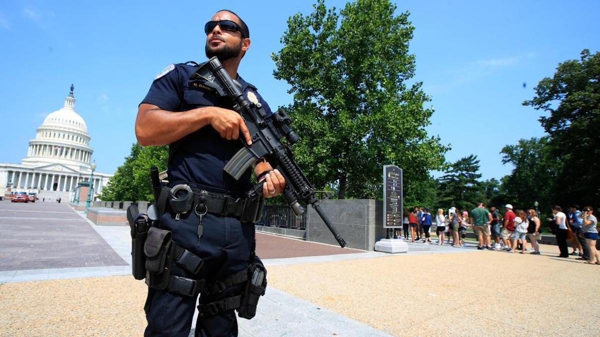 Capitol Hill Police officer Nathan Rainey stands guard on Capitol Hill in Washington on June 14, 2017, after House Majority Whip Steve Scalise of La. was shot during a congressional baseball practice in Alexandria, Va.