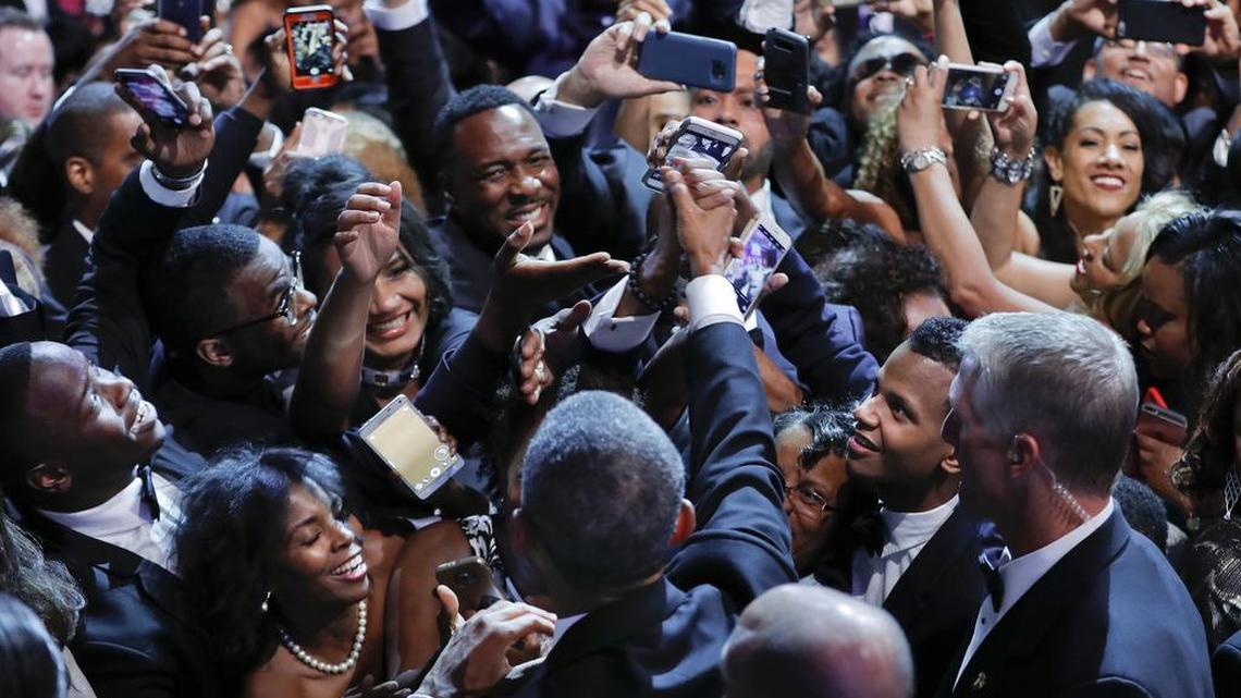 President Barack Obama greets guests after speaking at the Congressional Black Caucus Foundation's 46th Annual Legislative Conference Phoenix Awards Dinner, Saturday, Sept. 17, 2016 in Washington. In his remarks, Obama mocked Republican candidate Donald Trump for his election-eve renunciation of conspiracy theories about the president’s birthplace that Trump had long encouraged.