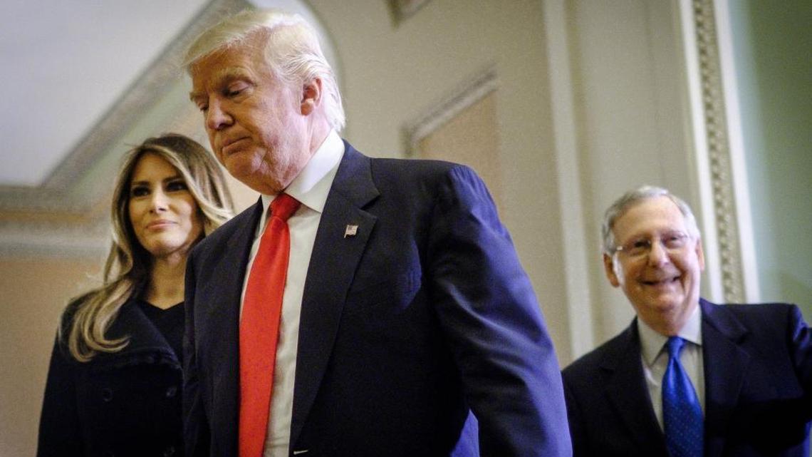 President-elect Donald Trump (center) with Melania Trump and Senate Majority Leader Mitch McConnell.