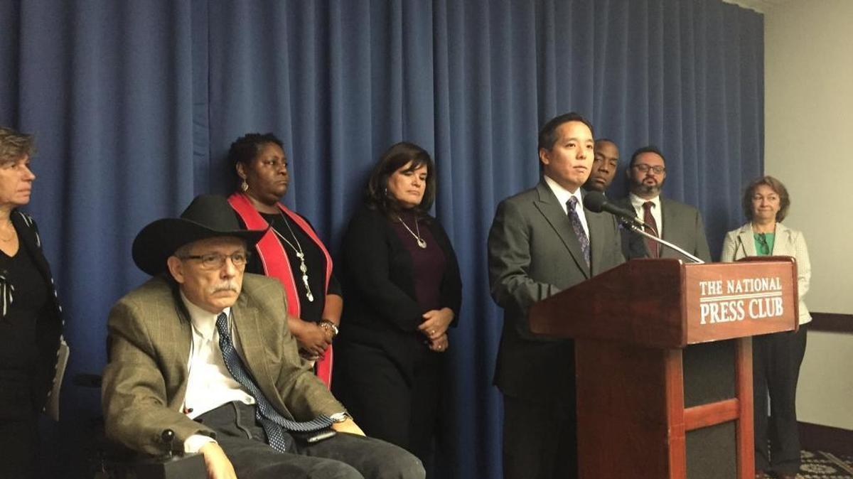 Christopher Kang, national director of the National Council of Asian Pacific Americans, speaks at a press briefing at the National Press Club in Washington, D.C., on Thursday, Nov. 10, 2016. A dozen minority organizations called on President-elect Donald Trump to denounce and stop his divisive rhetoric.