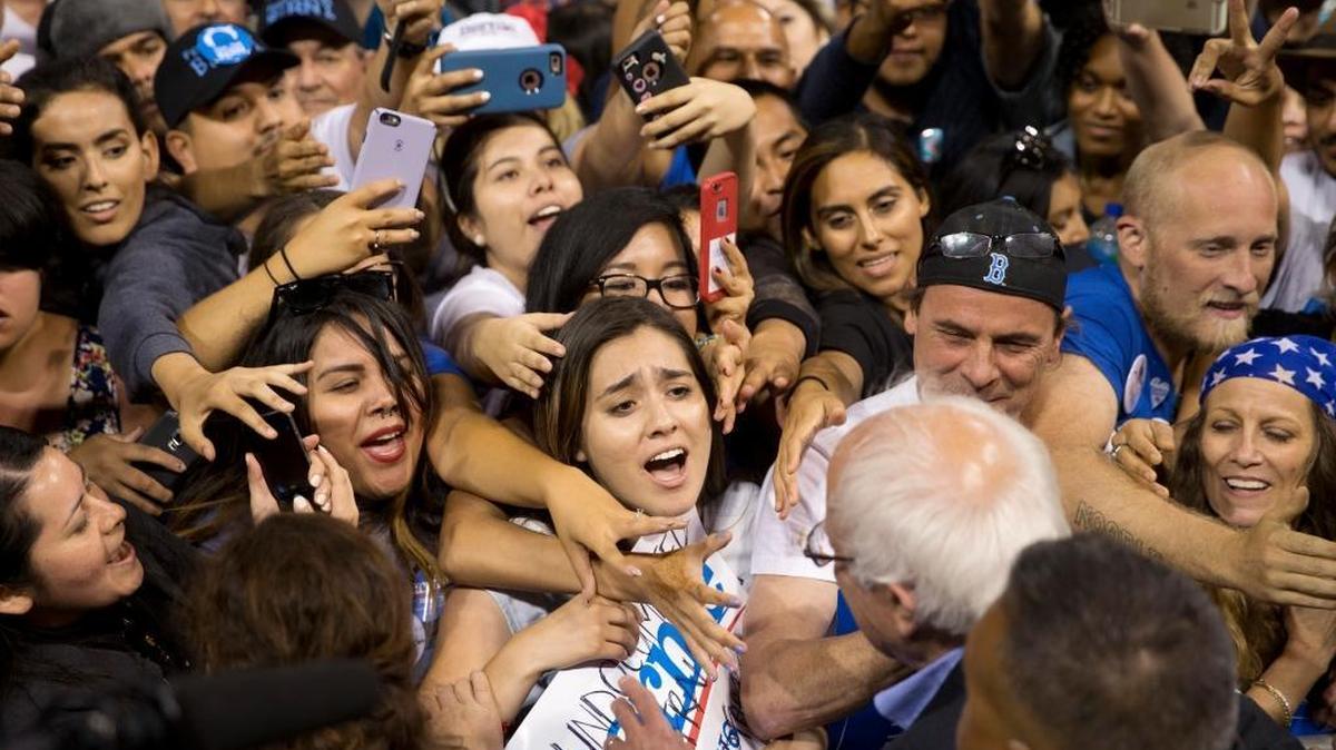 FILE - In this May 17, 2016 file photo, Democratic presidential candidate Sen. Bernie Sanders, I-Vt., greets supporters after speaking at a rally in Carson, Calif. Bernie Sanders' campaign is mining deep into voter data from Hispanic enclaves, scouting for hidden supporters in an effort to undercut Hillary Clinton in a contest that he has vowed to fight to the end.