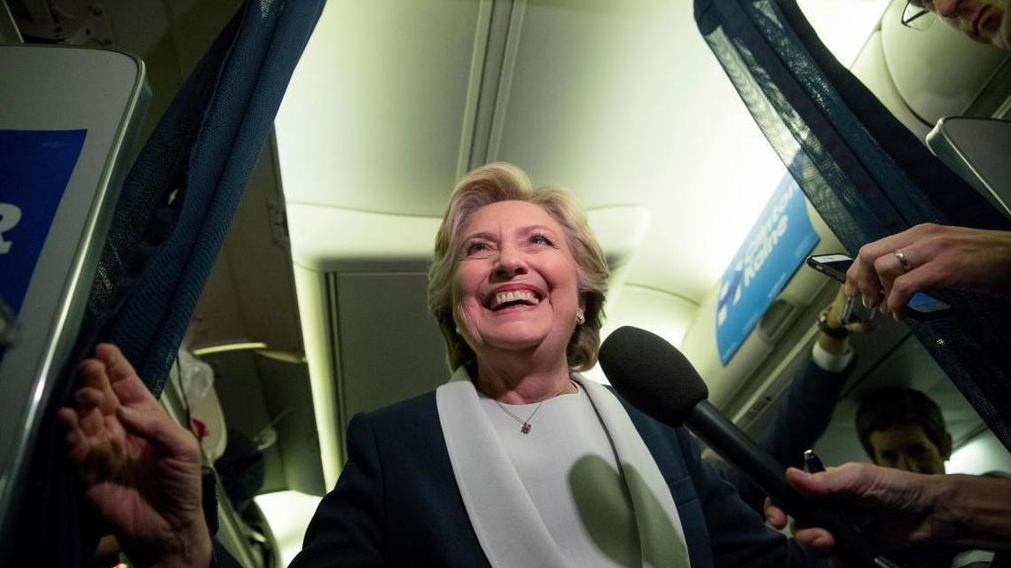 Hillary Clinton aboard her campaign plane at Lambert-St. Louis International Airport in St. Louis following the second presidential debate at Washington University on Sunday, Oct. 9, 2016.