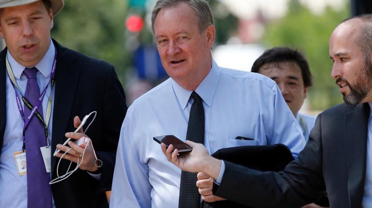 Sen. Michael Crapo, R-Idaho, is pursued by reporters as he arrives for a meeting with Republican presidential candidate Donald Trump and the Senate Republican Conference, July 7, 2016, at the National Republican Senatorial Committee headquarters in Washington.