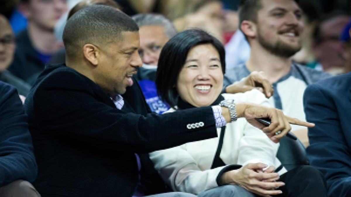Michelle Rhee talks with her husband, Sacramento Mayor Kevin Johnson, at a Sacramento Kings game on Monday, Feb, 1, 2016 at Sleep Train Arena in Sacramento.