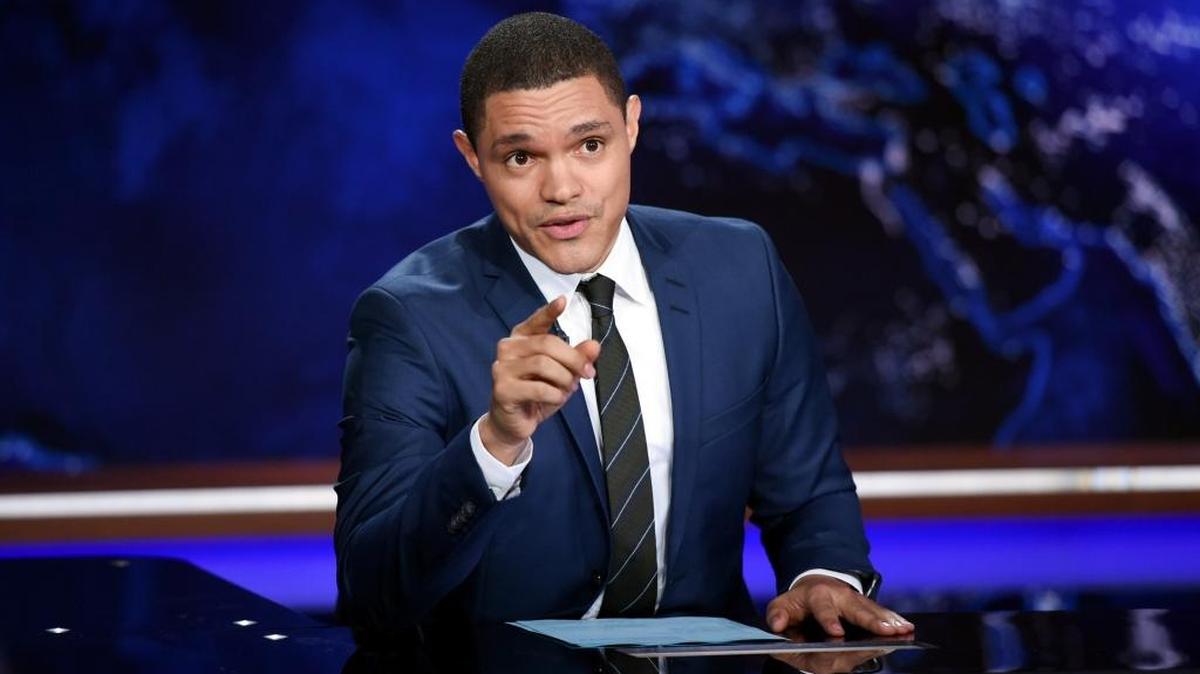 In this Sept. 29, 2015, file photo, Trevor Noah works on set during a taping of “The Daily Show with Trevor Noah” in New York.