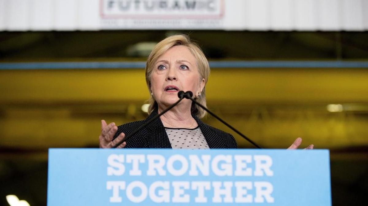 Democratic presidential candidate Hillary Clinton gives a speech on the economy after touring Futuramic Tool & Engineering, in Warren, Mich., Thursday, Aug. 11, 2016.