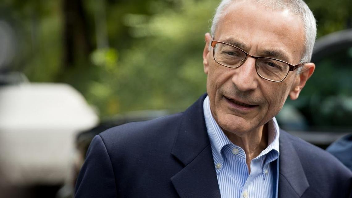 Clinton campaign manager John Podesta speaks to members of the media outside Democratic presidential candidate Hillary Clinton's home in Washington, Wednesday, Oct. 5, 2016.