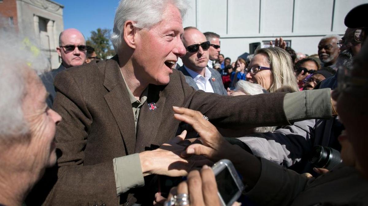 Former President Bill Clinton campaigns for his wife, Democratic presidential candidate Hillary Clinton, during a stop on North Church Street in Rocky Mount as part of a bus tour across Eastern North Carolina on Oct. 25, 2015.
