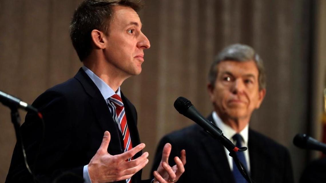 Democratic candidate Jason Kander, left, speaks along side Republican incumbent Sen. Roy Blunt during the first general election debate in Missouri's race for U.S. Senate at the Missouri Press Association convention Friday, Sept. 30, 2016, in Branson, Mo.