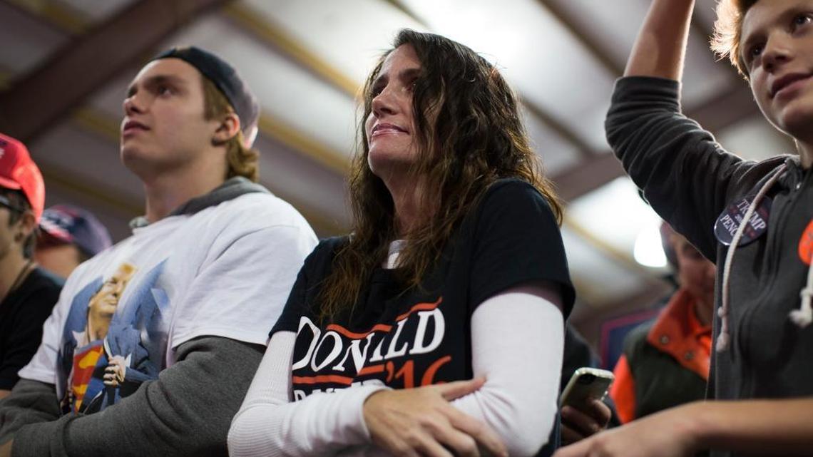 Supporters of Republican presidential candidate Donald Trump listen to him speak during a campaign rally, Monday, Nov. 7, 2016, in Leesburg, Va.