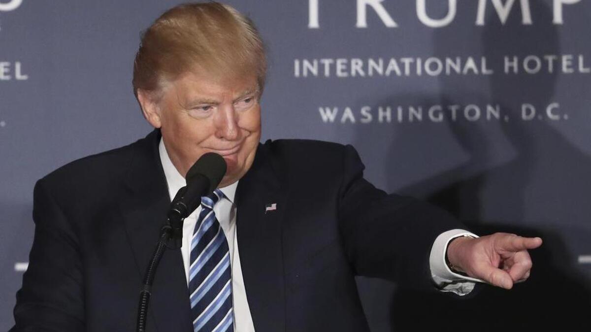 Republican presidential candidate Donald Trump speaks during the grand opening of Trump International Hotel in Washington, Wednesday, Oct. 26, 2016. Donald Trump and his children hosted an official ribbon cutting ceremony and press conference to celebrate the grand opening of his new hotel.