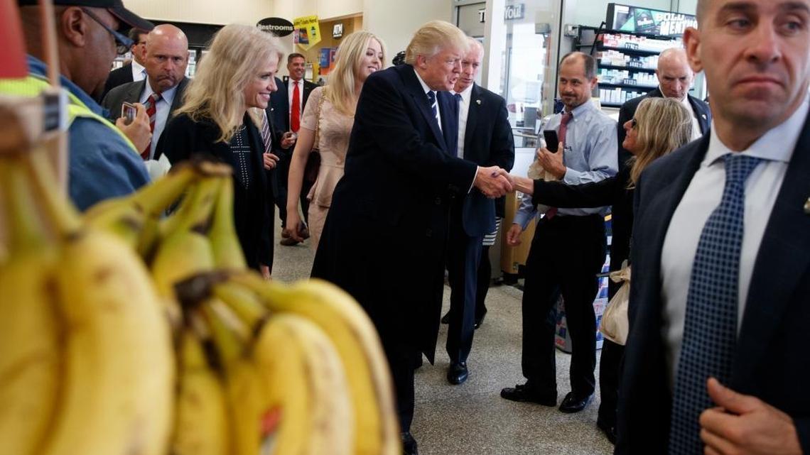 Republican presidential candidate Donald Trump talks with customers during a visit to a Wawa gas station, Tuesday, Nov. 1, 2016, in King of Prussia, Pa. A consumer survey found supporters of Hillary Clinton are more likely to patronize Wawa.