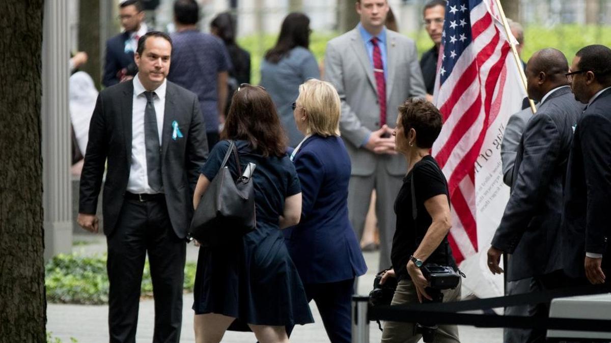 Democratic presidential candidate Hillary Clinton, departs after attending a ceremony for the 15th anniversary of the attacks of the World Trade Center at the National September 11 Memorial, in New York, Sunday, Sept. 11, 2016.