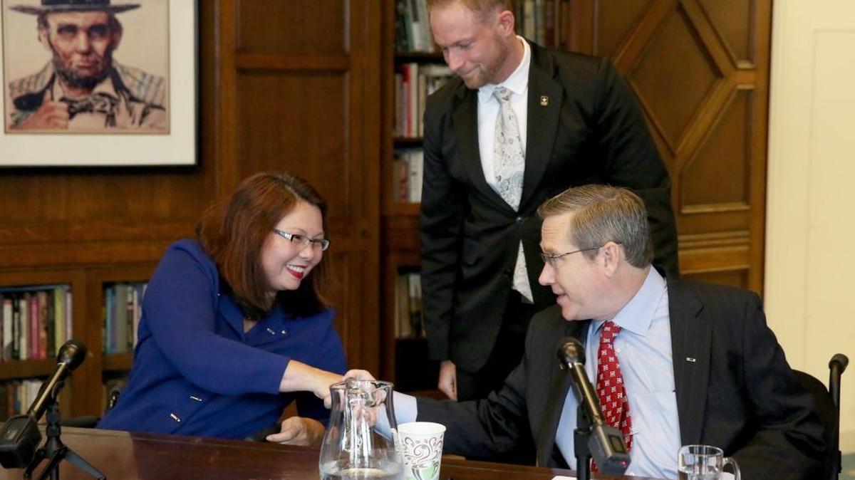 U.S. Senate candidates Rep. Tammy Duckworth and Sen. Mark Kirk shake hands after their debate Oct. 3, 2016, in the Chicago Tribune editorial board room.