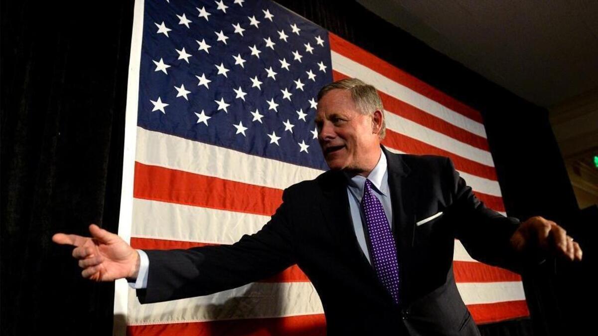 North Carolina U.S. Sen. Richard Burr, R-Winston-Salem, calls staff to the stage for photos following his victory speech at the Forsyth Country Club in Winston-Salem, N.C., on Tuesday, Nov. 8, 2016. Burr defeated Democrat Deborah Ross and he posted the widest win margin of any Republican at the top of the ticket in North Carolina.