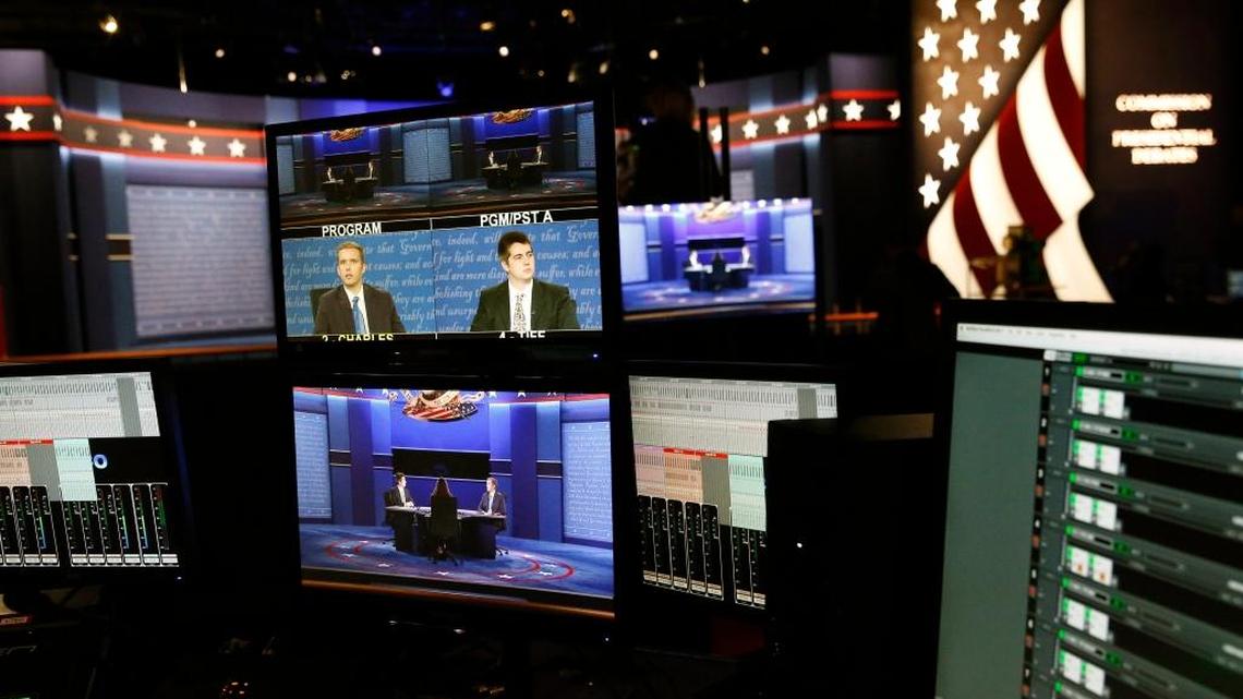 Students siting in on the stage are displayed on television monitors during preparations for the vice-presidential debate between Republican vice-presidential nominee Gov. Mike Pence and Democratic vice-presidential nominee Sen. Tim Kaine at Longwood University in Farmville, Va.