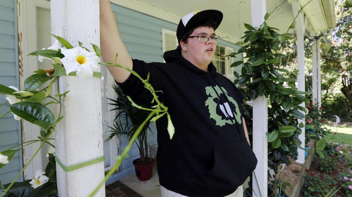 In this Aug. 25, 2015 file photo, Gavin Grimm is interviewed at his home in Gloucester, Va. Grimm is a transgender student whose demand to use the boys' restrooms has divided the community and prompted a lawsuit.