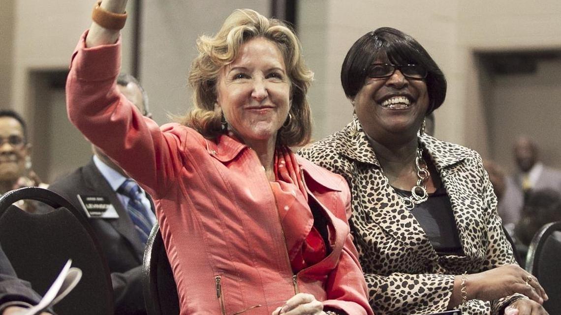 FILE – U.S. Sen. Kay Hagan acknowledges the crowd upon her introduction at the 147th Annual Session of the General Baptist State Convention on October 29, 2014, at the Greenville Convention Center in Greenville, N.C. Hagan was recently diagnosed with encephalitis, a disease likely caused by a virus that leads to inflammation of the brain.