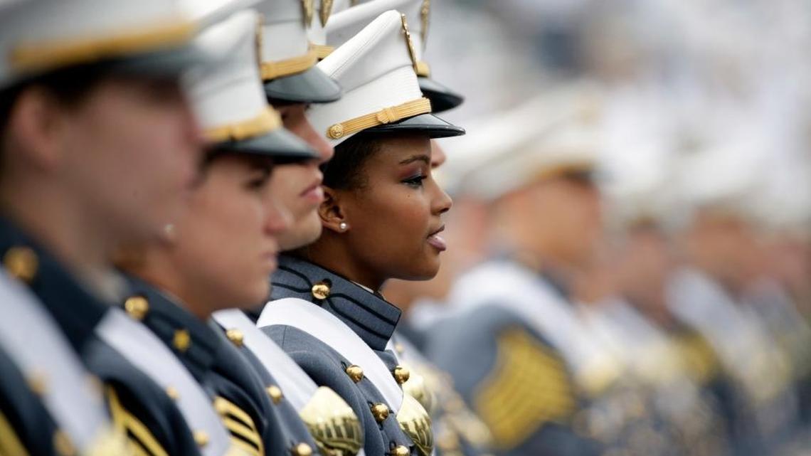 In this Saturday, May 21, 2016 file photo, cadets attend their graduation and commissioning ceremony at the U.S. Military Academy in West Point, N.Y.