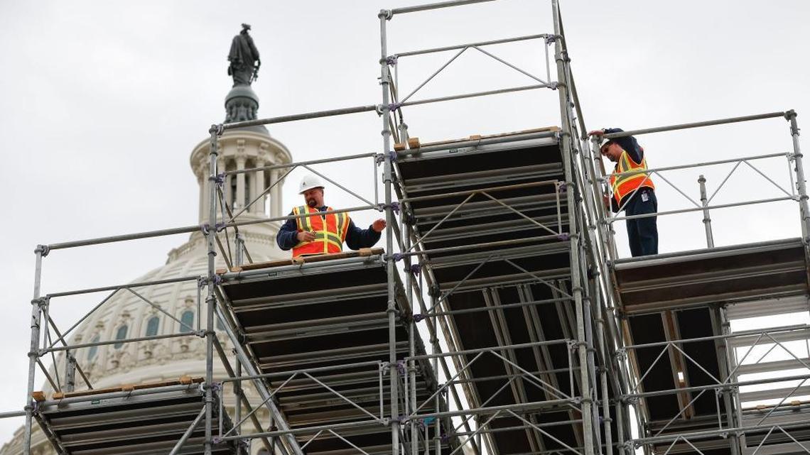 Construction continues on the inaugural platform in preparation for the inauguration and swearing-in ceremonies for President-elect Donald Trump, Dec. 8, 2016, on the Capitol steps in Washington. Trump will be sworn in as president on Friday.