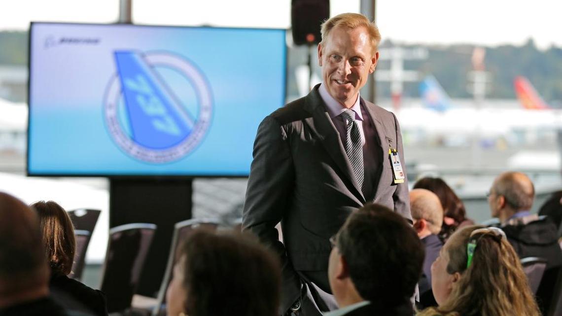 Pat Shanahan, senior vice president of airplane programs for Boeing Commercial Airplanes, greets guests at a reopening ceremony for Boeing's newly expanded 737 delivery center, Oct. 19, 2015, at Boeing Field in Seattle.