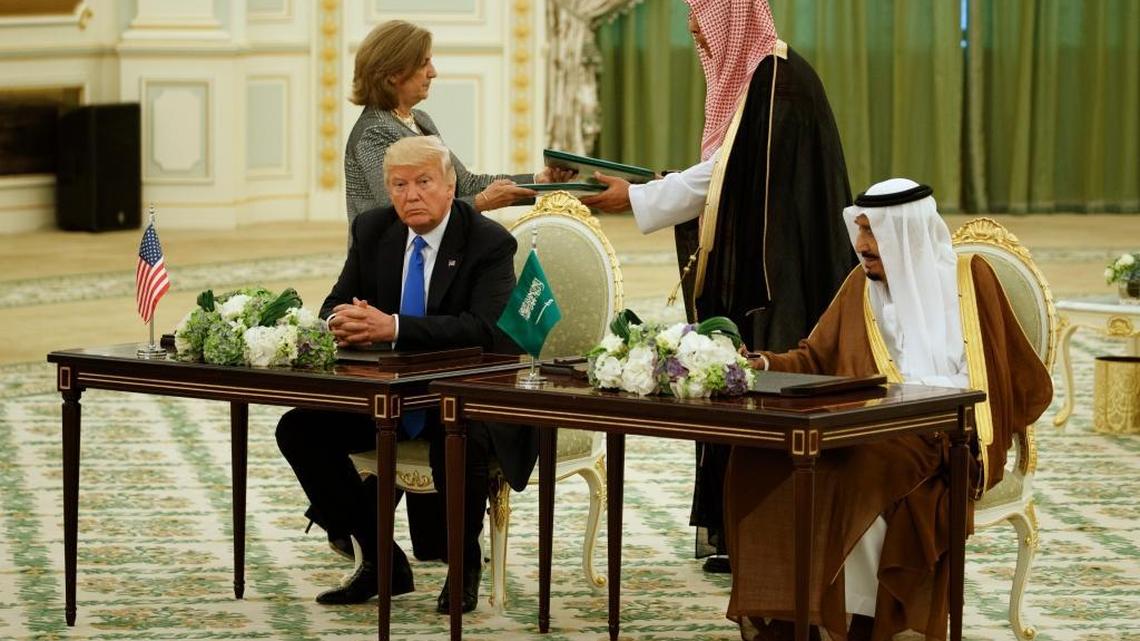 President Donald Trump and Saudi King Salam signed agreements at the Royal Court Palace on Saturday.