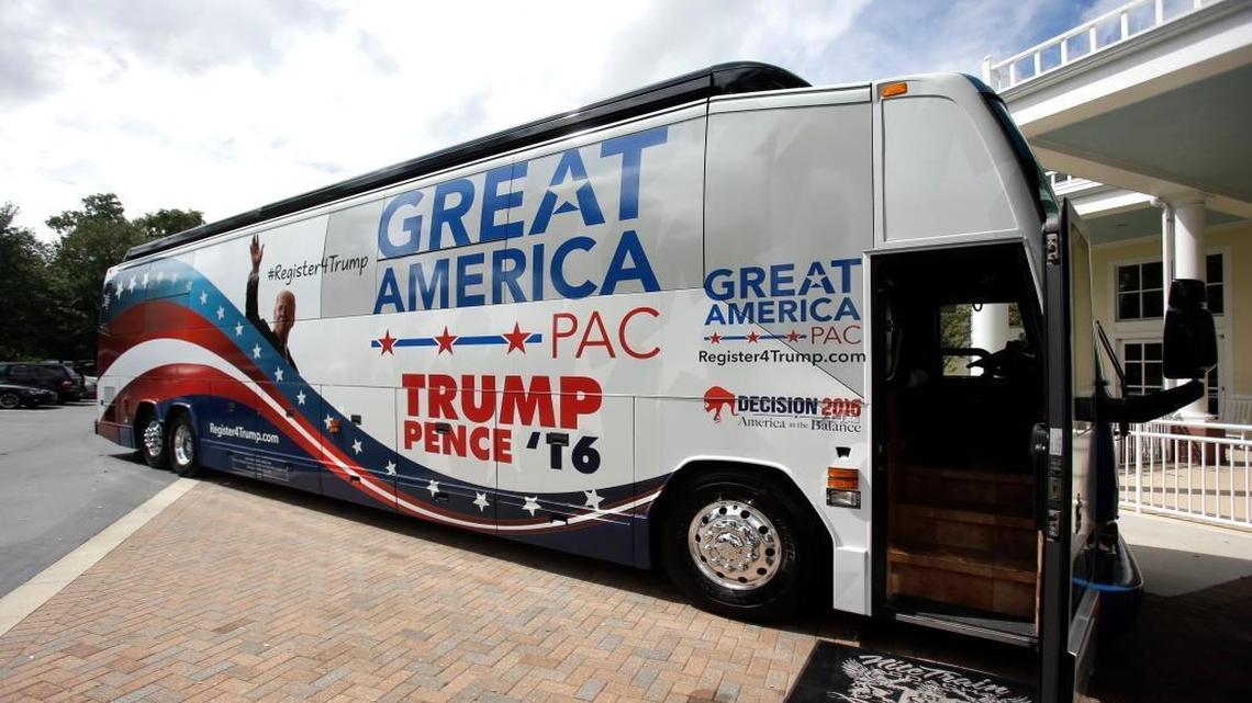In this Monday, Sept. 12, 2016 photo, the Great America PAC bus makes a stop for a town hall meeting in Lake Mary, Fla. The Great America PAC is rolling through battleground states, opening offices and registering voters. Presidential hopefuls often embark on bus tours to meet voters across the country. This time, a super PAC is standing in for Republican nominee Donald Trump.