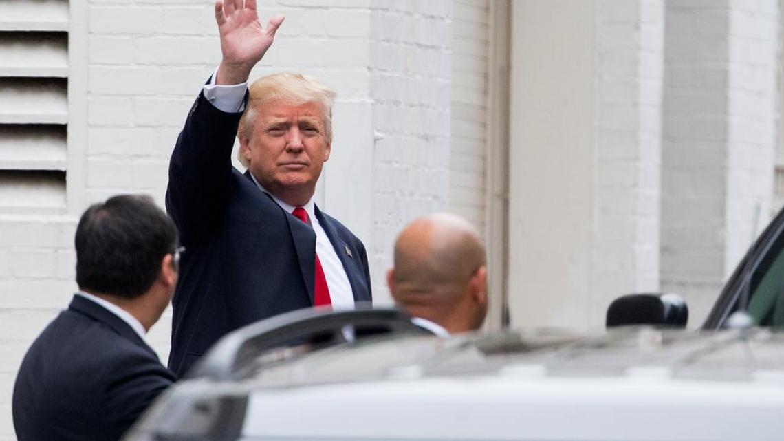 Republican presidential candidate Donald Trump waves as he arrives for a meeting with House Speaker Paul Ryan of Wis., in Washington, Thursday, May 12, 2016. Donald Trump is resisting renewed calls to release his tax returns, telling a TV interviewer that his tax rate is “none of your business” – though he’d be the first presidential nominee in 40 years to not release his returns.