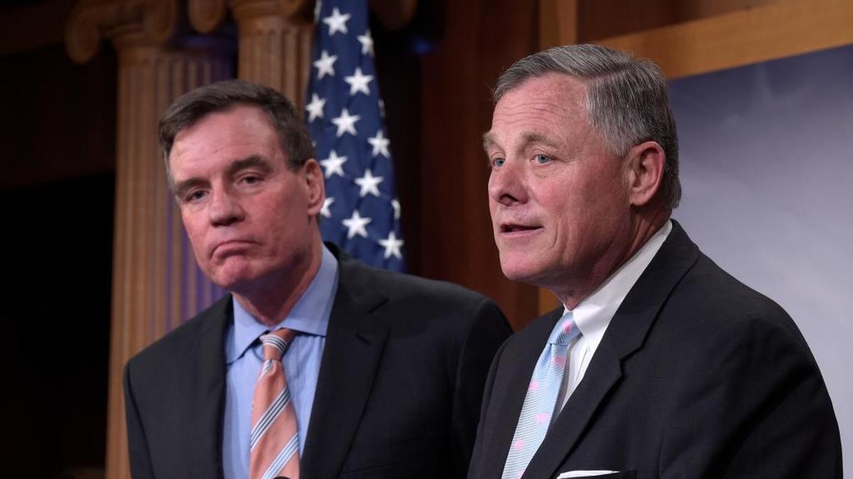 Senate Intelligence Committee Chairman Sen. Richard Burr, R-N.C., right, and the committee's Vice Chairman, Sen. Mark Warner, D-Va. meet with reporters on Capitol Hill in Washington, Wednesday, March 29, 2017, to discuss the committee's investigation of Russian interference in the 2016 election.