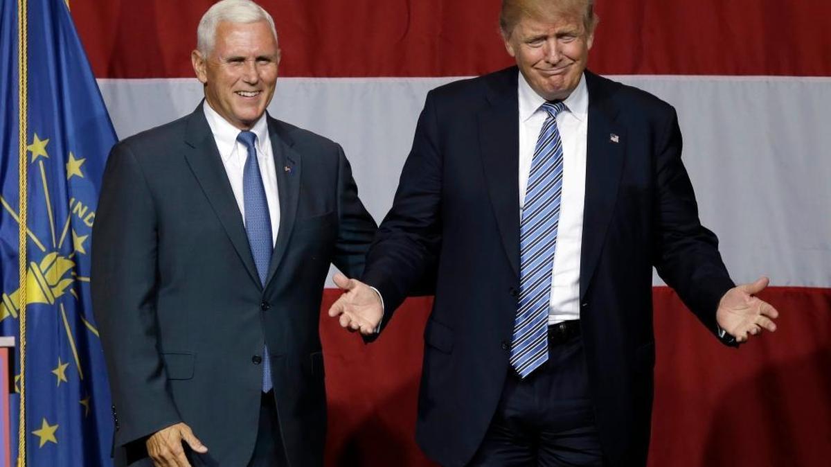 Indiana Gov. Mike Pence joins Republican presidential candidate Donald Trump at a rally in Westfield, Ind., Tuesday, July 12, 2016.