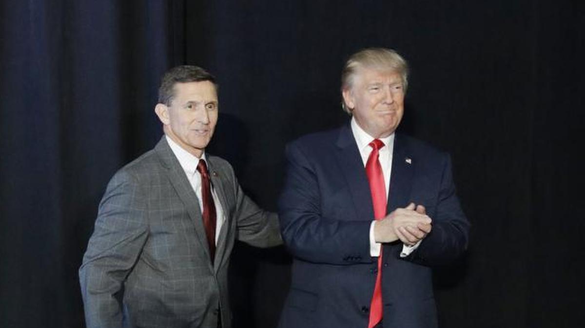 In 2016 Gen. Michael Flynn, left, introduced then-Republican presidential candidate Donald Trump at a campaign rally. Flynn later resigned after 23 days as Trump’s national security adviser.