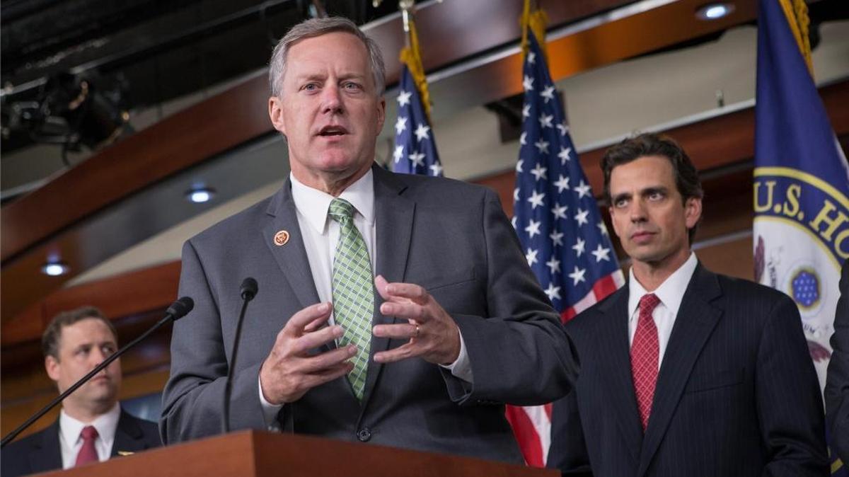 Rep. Mark Meadows, R-N.C, center, has long been interested in repealing the Affordable Care Act. Here Meadows, with Rep. Tom Graves, R-Ga., right, and other conservative Republicans discuss their goal of obstructing the Affordable Care Act, popularly known as Obamacare, on Capitol Hill in Washington, Thursday, Sept. 19, 2013.