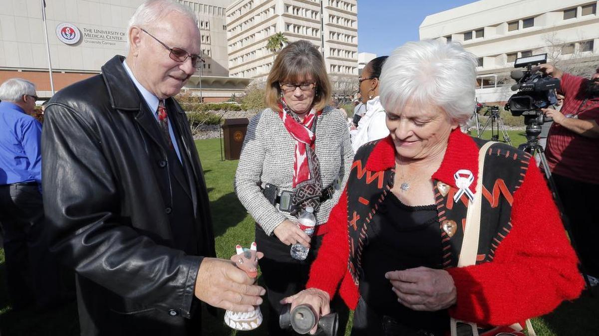 Tucson shooting survivors Bill Posey and Nancy Bowman, center, and Patricia Maisch, who helped stop the shooter, ring bells during a remembrance ceremony on the third anniversary of the Tucson shootings, Wednesday, Jan. 8, 2014, in Tucson, Ariz. Six people were killed and 13 wounded, including U.S. Rep. Gabrielle Giffords, D-Ariz., in the shooting rampage at a community event hosted by Giffords in 2011. Jared Lee Loughner was sentenced in November 2012 to seven consecutive life sentences, plus 140 years, after he pleaded guilty to 19 federal charges in the shooting.