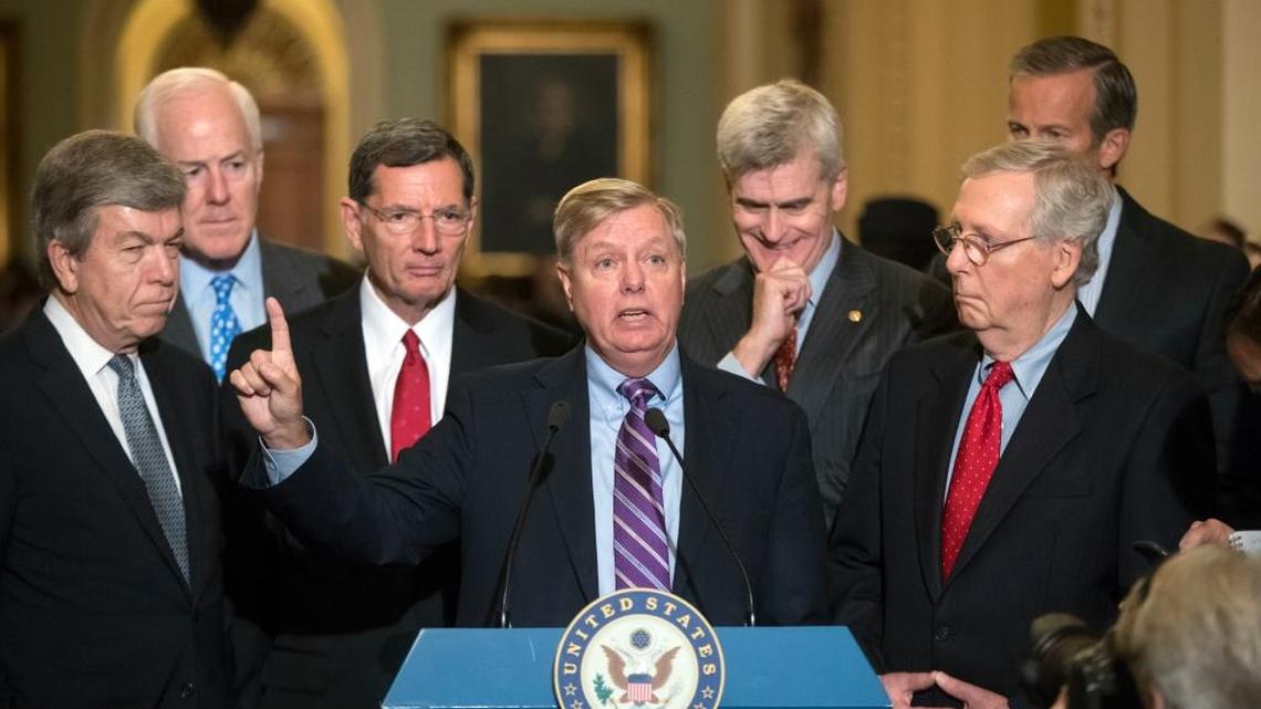 Sen. Lindsey Graham, R-S.C., joined by, from left, Sen. Roy Blunt, R-Mo., Majority Whip John Cornyn, R-Texas, Sen. John Barrasso, R-Wyo., Sen. Bill Cassidy, R-La., Senate Majority Leader Mitch McConnell, R-Ky., and Sen. John Thune, R-S.D., speaks to reporters as he pushes a last-ditch effort to uproot former President Barack Obama's health care law.