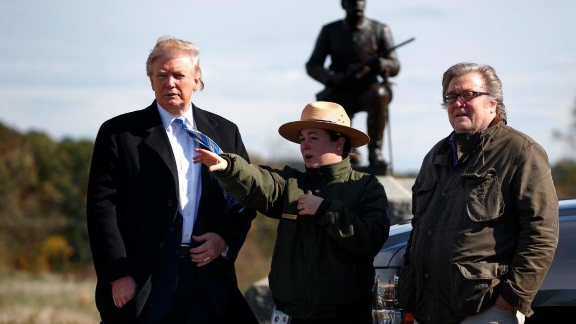 Interpretive park ranger Caitlin Kostic, center, gives a tour of the Gettysburg National Military Park to Republican presidential candidate Donald Trump, left, and Steve Bannon on Oct. 22, 2016, in Gettysburg, Pa. Bannon is a founder and former executive of Breitbart, is one of Trump’s top advisers and has long campaigned to discredit climate change scientists.