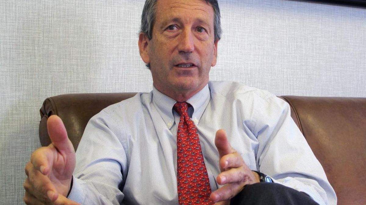 In this Dec. 18, 2013, file photo, U.S. Rep. Mark Sanford, R-S.C., discusses his first months back in Congress during an interview in Mount Pleasant, S.C. A spokesman for the South Carolina Law Enforcement Division said on Tuesday, July 12, 2016 that the agency is investigating after Sanford's niece's foot was apparently injured in an incident involving the congressman. An incident report said it happened on June 18, 2016 on a dock at the Sanford family farm near Beaufort, S.C.