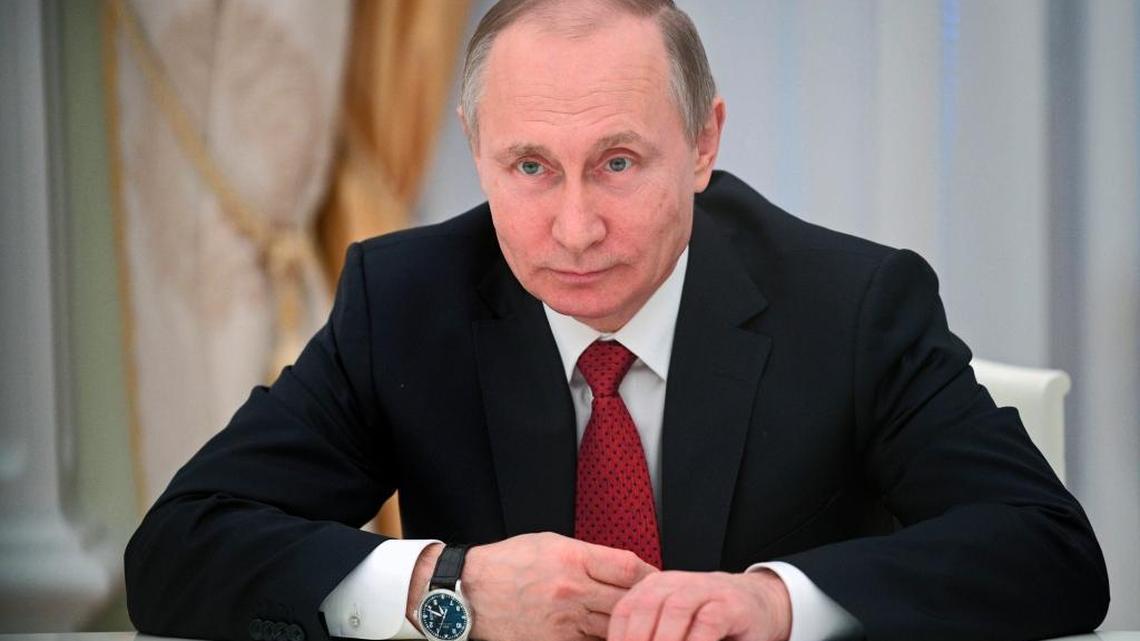 Russian President Vladimir Putin looks on during a meeting with China's National People's Congress Chairman Zhang Dejiang at the Kremlin in Moscow, Russia.