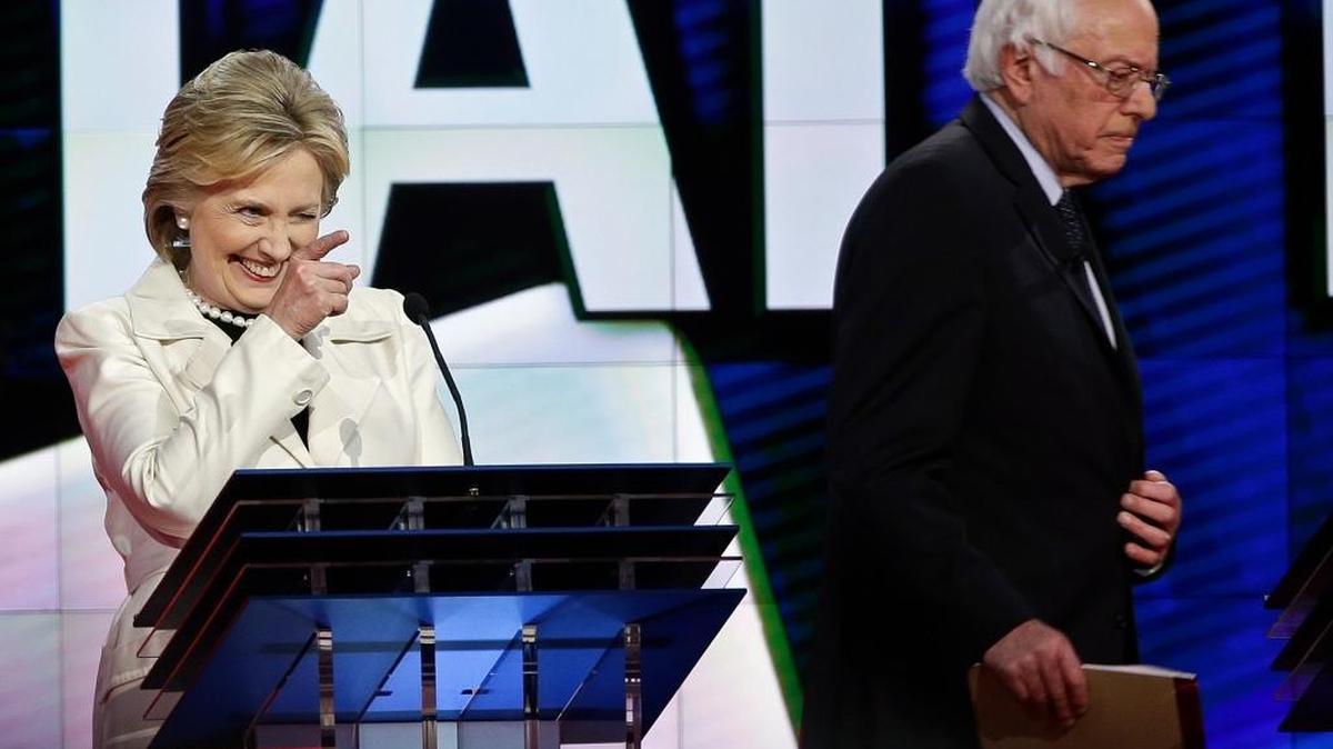 Democratic presidential candidate Hillary Clinton and Sen. Bernie Sanders, I-Vt. during the CNN Democratic Presidential Primary Debate at the Brooklyn Navy Yard Thursday. Clinton has released years of personal tax information while Republican candidate Donald Trump has not. Sanders and GOP candidates Ted Cruz and John Kasich have provided only partial information about their taxes.