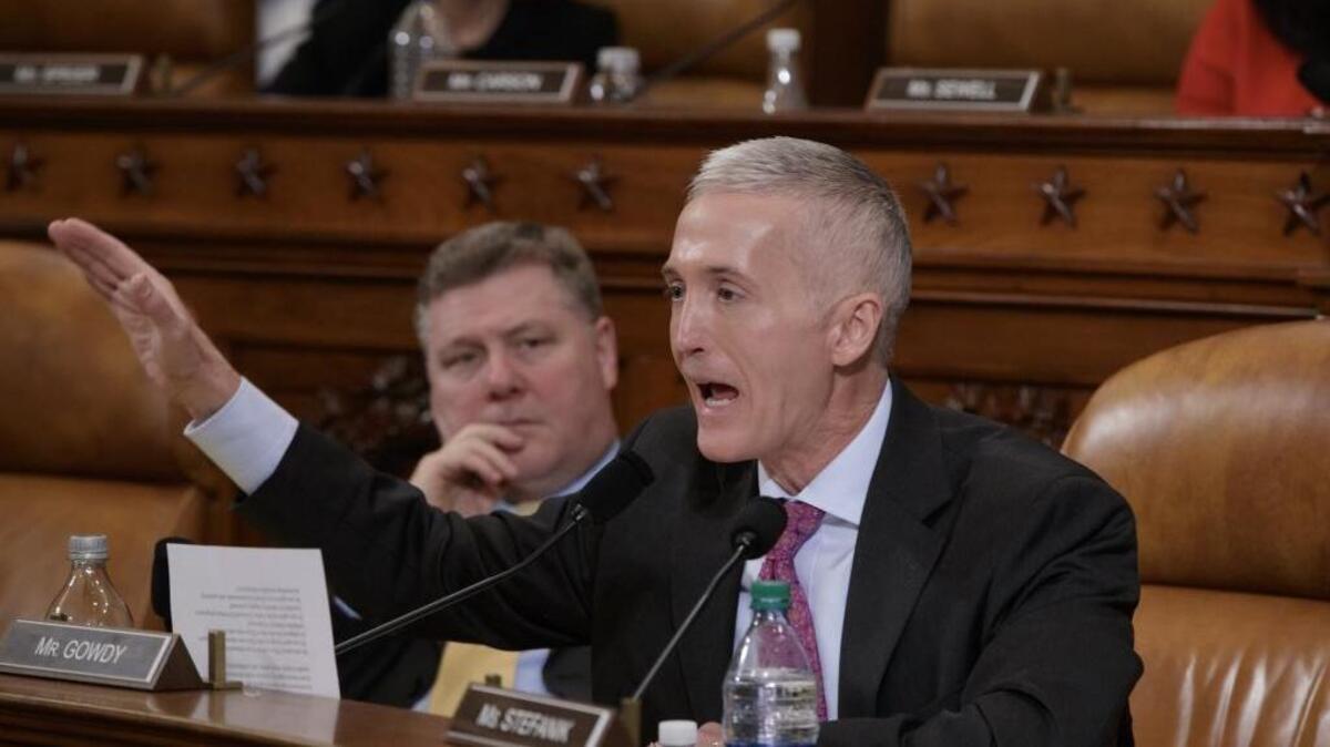 House Intelligence Committee member Rep. Trey Gowdy, R-S.C., right, accompanied by Rep. Rick Crawford, R-Ark., questions FBI Director James Comey on Capitol Hill in Washington, March 20, 2017, during the committee's hearing on allegations of Russian interference in the 2016 U.S. presidential election.