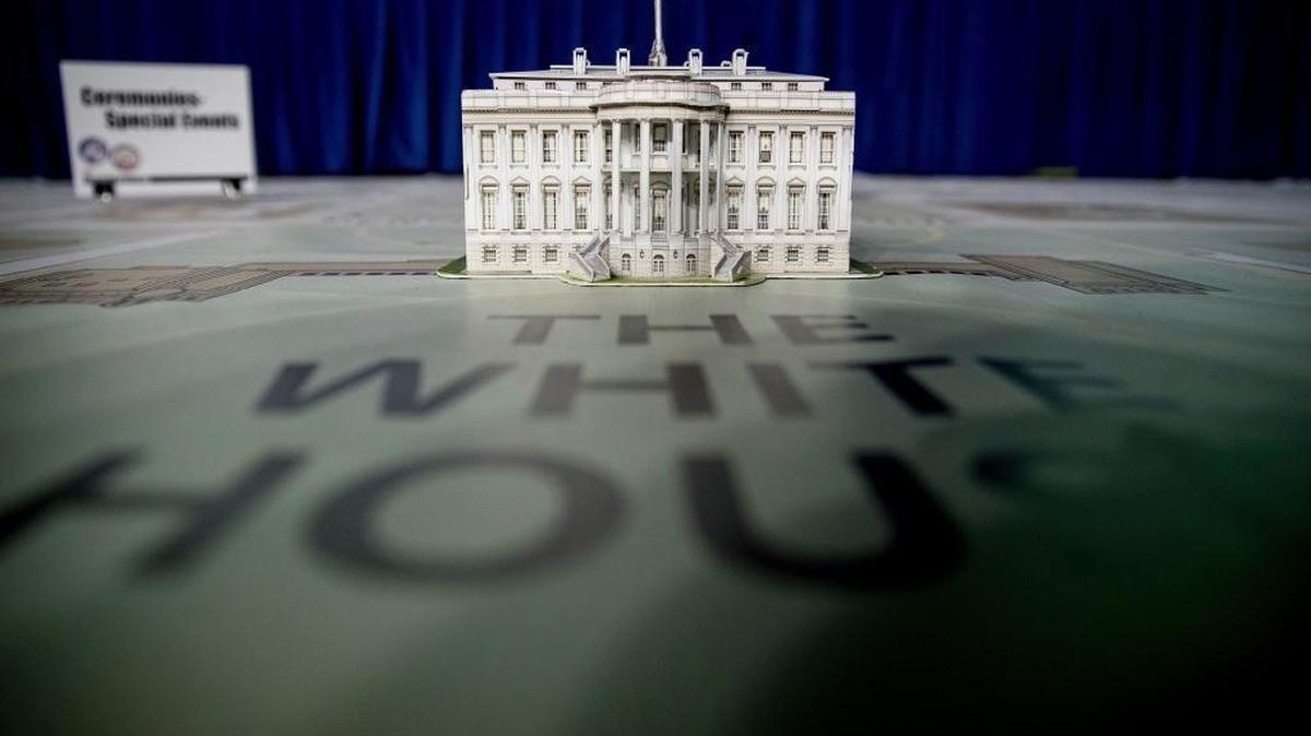 FILE – A model of the White House displayed on a giant planning map during a media tour highlighting 2017 presidential inaugural preparations. The annual North Carolina State Society Inaugural Ball will host nearly 1,000 attendees and feature several North Carolina-based businesses.
