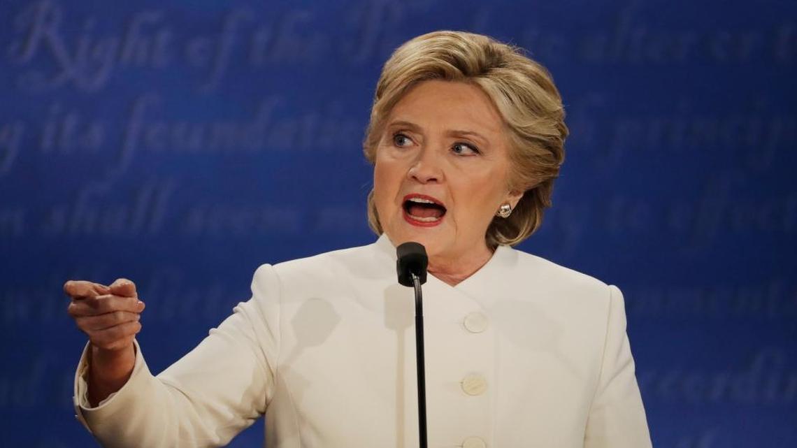 Democratic presidential nominee Hillary Clinton speaks to Republican presidential nominee Donald Trump during the third presidential debate at UNLV in Las Vegas, Wednesday, Oct. 19, 2016.