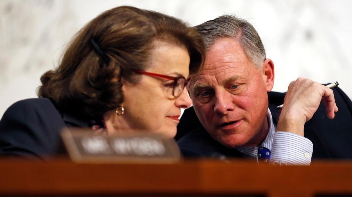 In this Feb. 9, 2016 file photo, Senate Intelligence Committee Vice Chair Sen. Dianne Feinstein, D-Calif., talks with committee chairman Sen. Richard Burr, R-N.C. on Capitol Hill in Washington. Feinstein and Burr worked together on draft legislation to require companies to help the government access to encrypted data. The bill, however, has never been introduced and is likely dead.