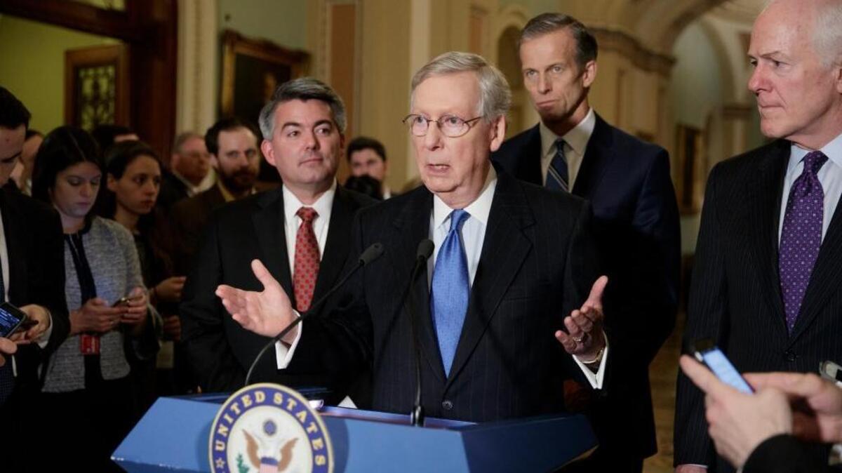 Senate Majority Leader Mitch McConnell, R-Ky., joined by, from left, Sen. Cory Gardner, R-Colo., Sen. John Thune, R-S.D., and Majority Whip John Cornyn, R-Texas, meets with reporters on Capitol Hill before President Donald Trump's speech to the nation, in Washington, Tuesday, Feb. 28, 2017.