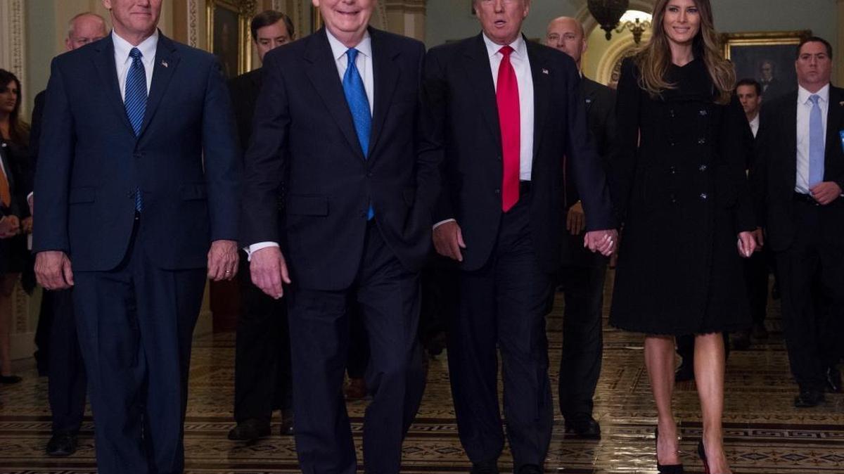 President-elect Donald Trump, his wife Melania, and Vice President-elect Mike Pence, walk with Senate Majority Leader Mitch McConnell of Ky., on Capitol Hill Thursday, Nov. 10, 2016.