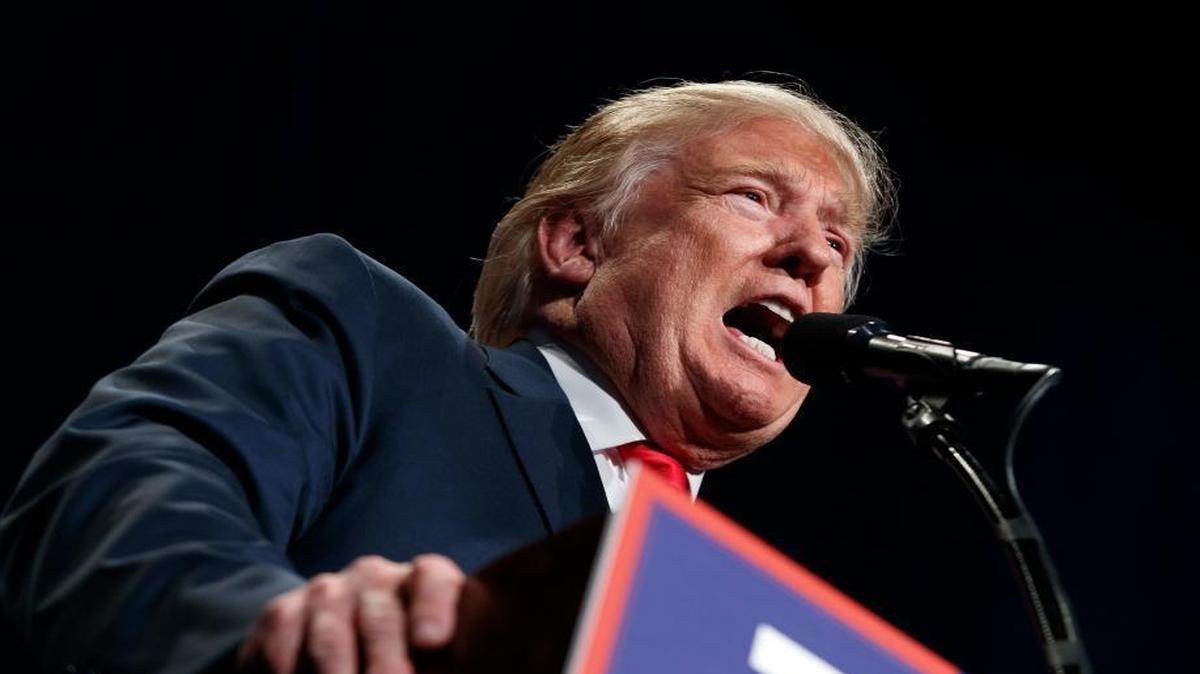 File-This Oct. 5, 2016, file photo shows Republican presidential candidate Donald Trump speaking during a campaign rally, in Reno, Nev.