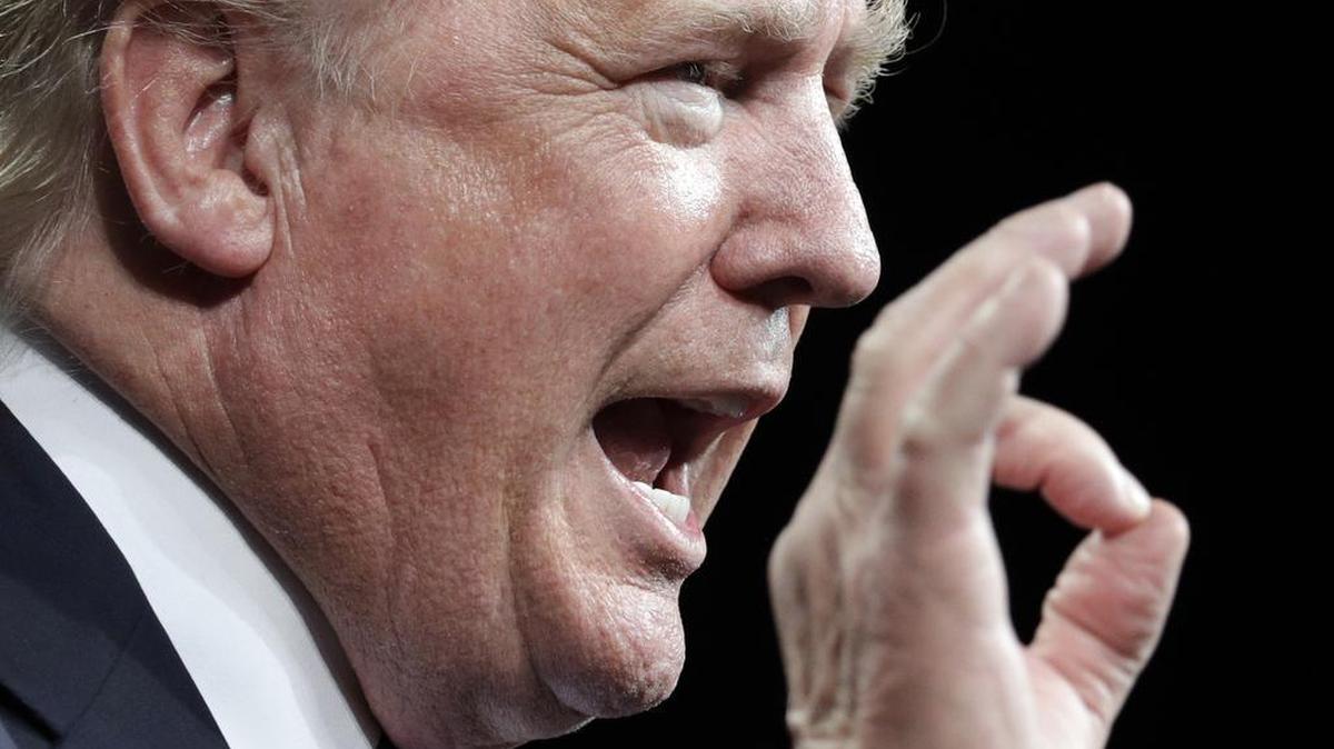 Republican presidential candidate Donald Trump speaks at a rally, Friday, Sept. 30, 2016, in Novi, Mich.