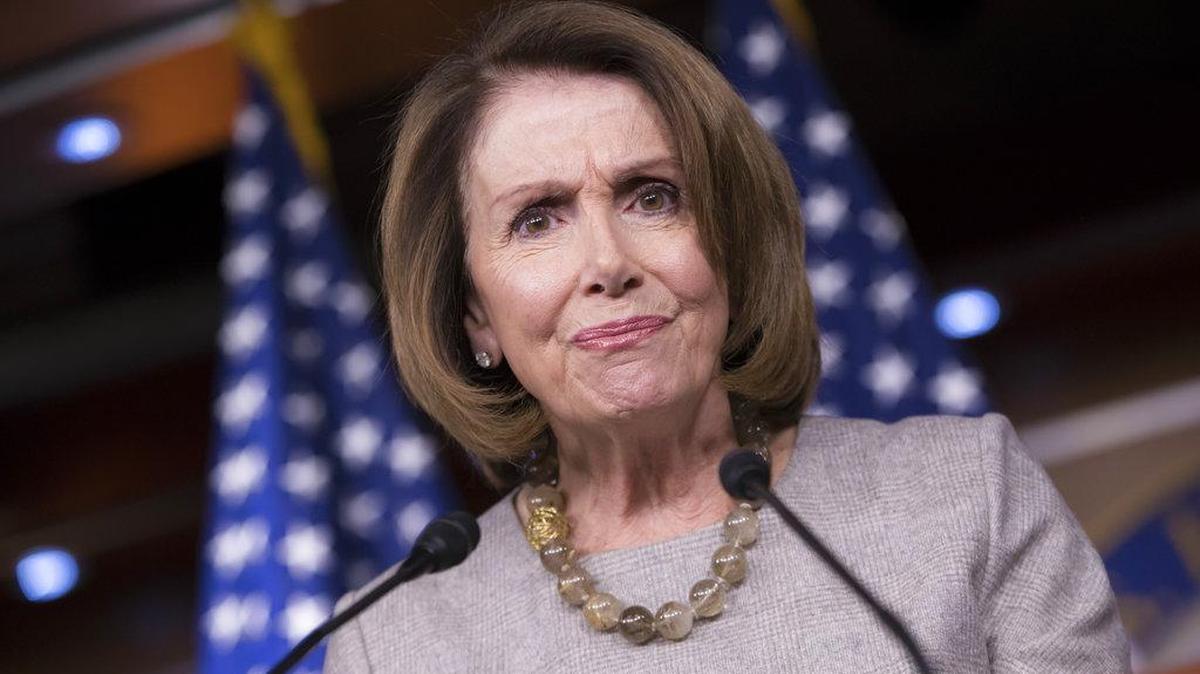 House Minority Leader Nancy Pelosi of Calif. listens during a news conference on Capitol Hill in Washington.